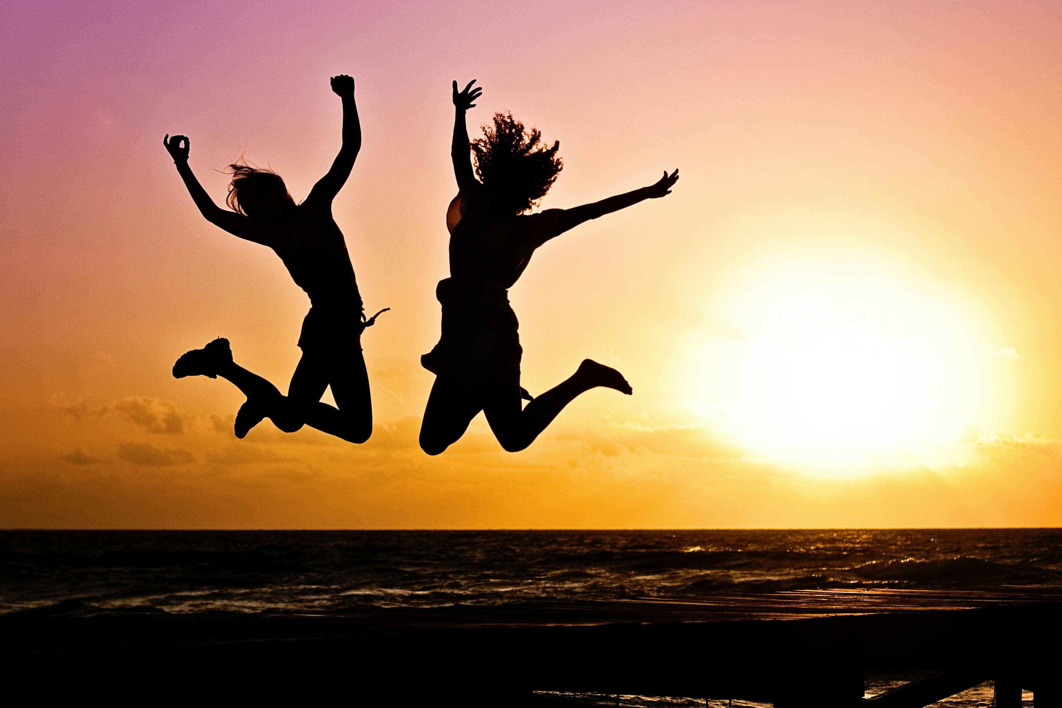 Photo of people jumping to celebrate a win